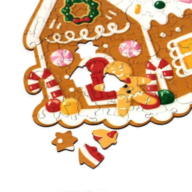 Houten puzzel in koker gingerbread kerst huis