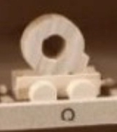 Houten letter Q
