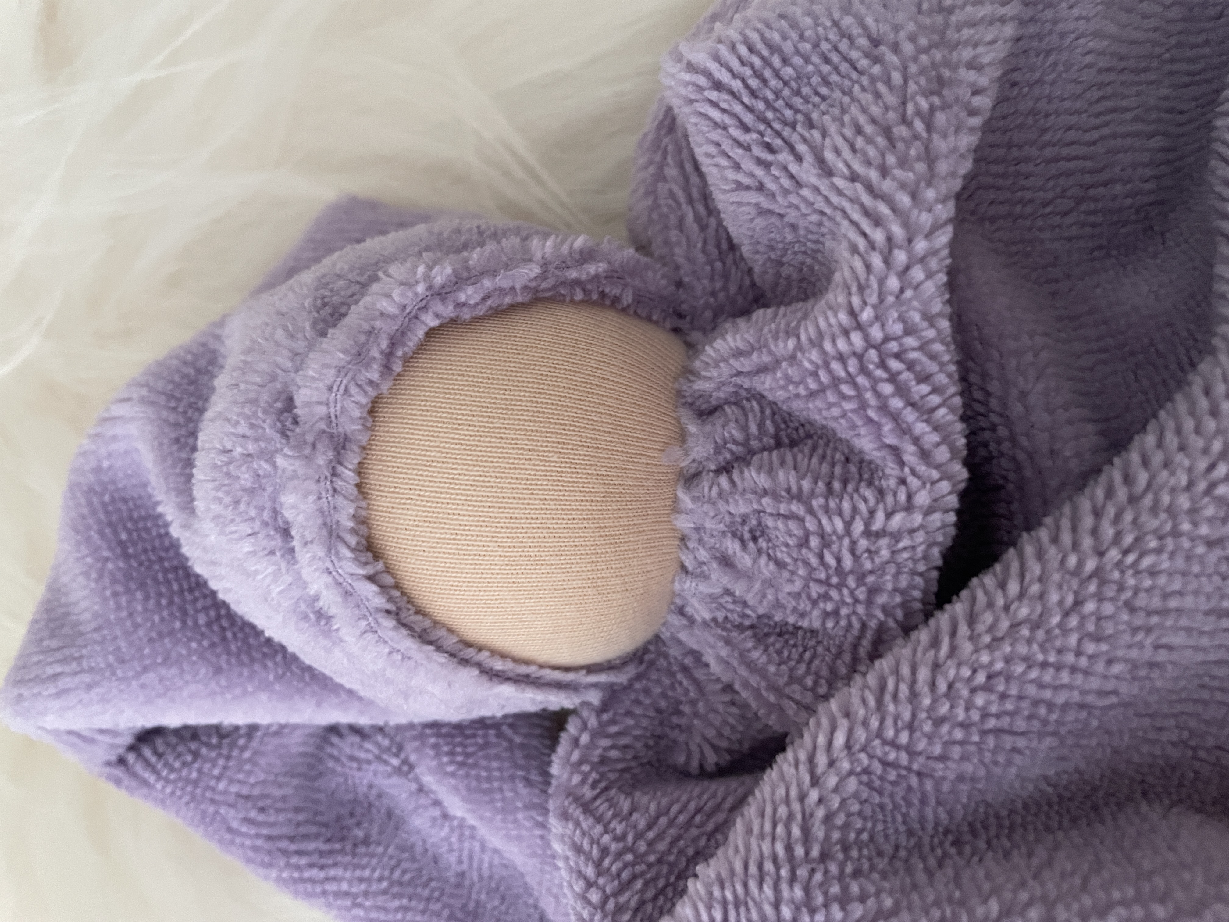 Cuddly doll gray / green with slightly tinted skin color