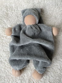 Cuddly doll gray / green with slightly tinted skin color