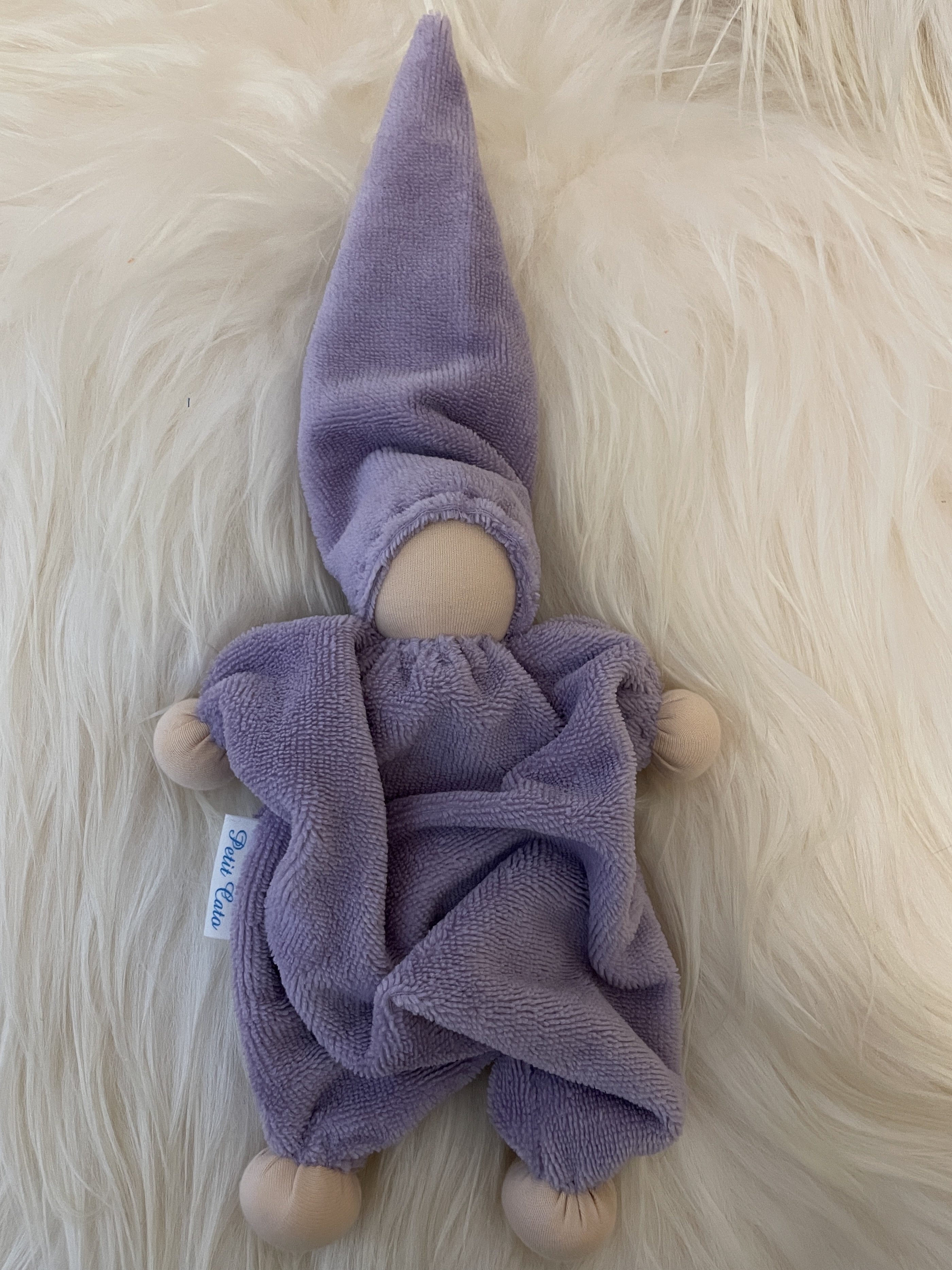 Cuddly doll gray / green with slightly tinted skin color