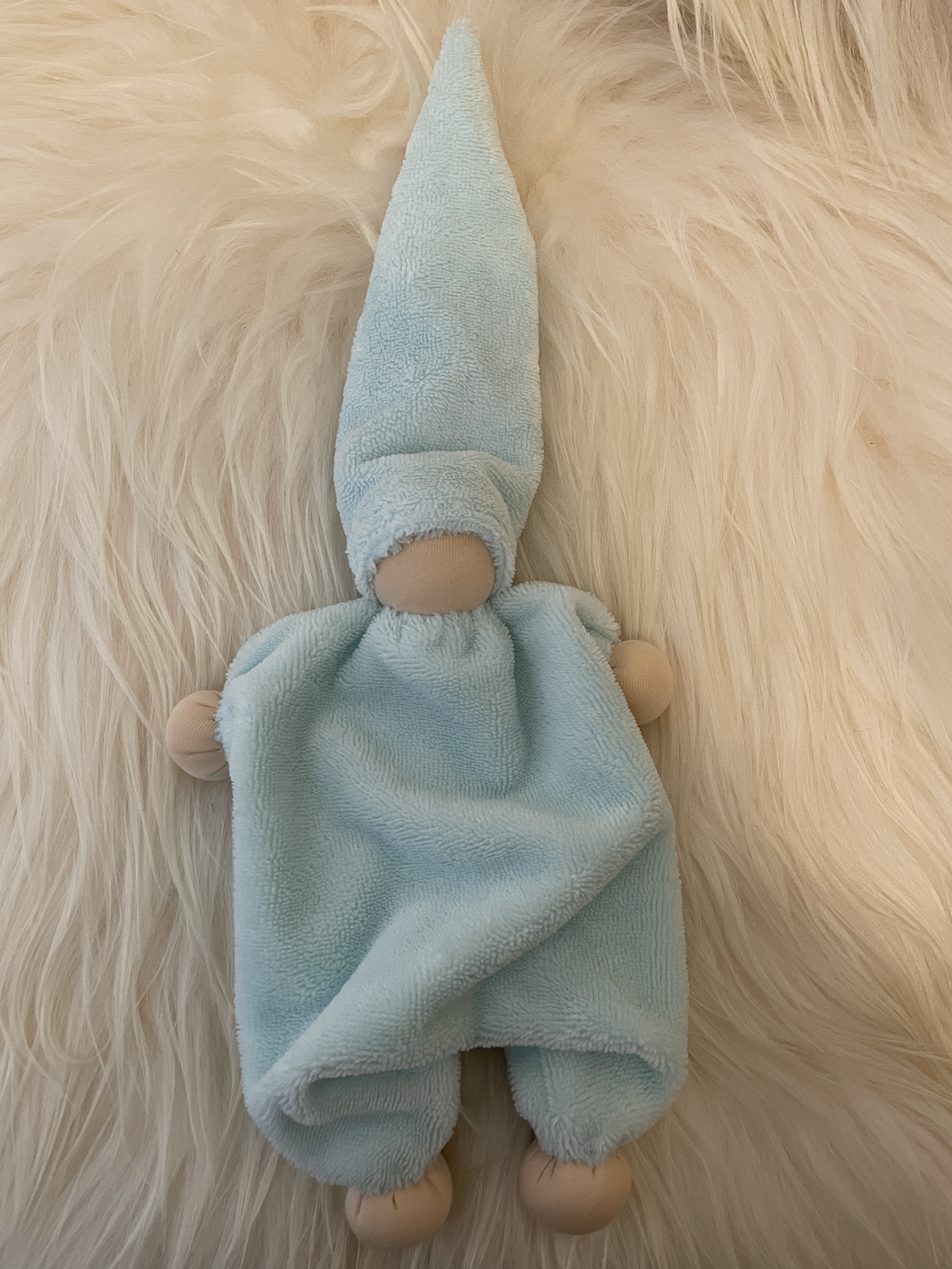 Cuddly doll turquoise light skin tone