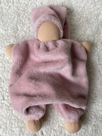 Cuddly doll pink with slightly tinted skin tone and rattle