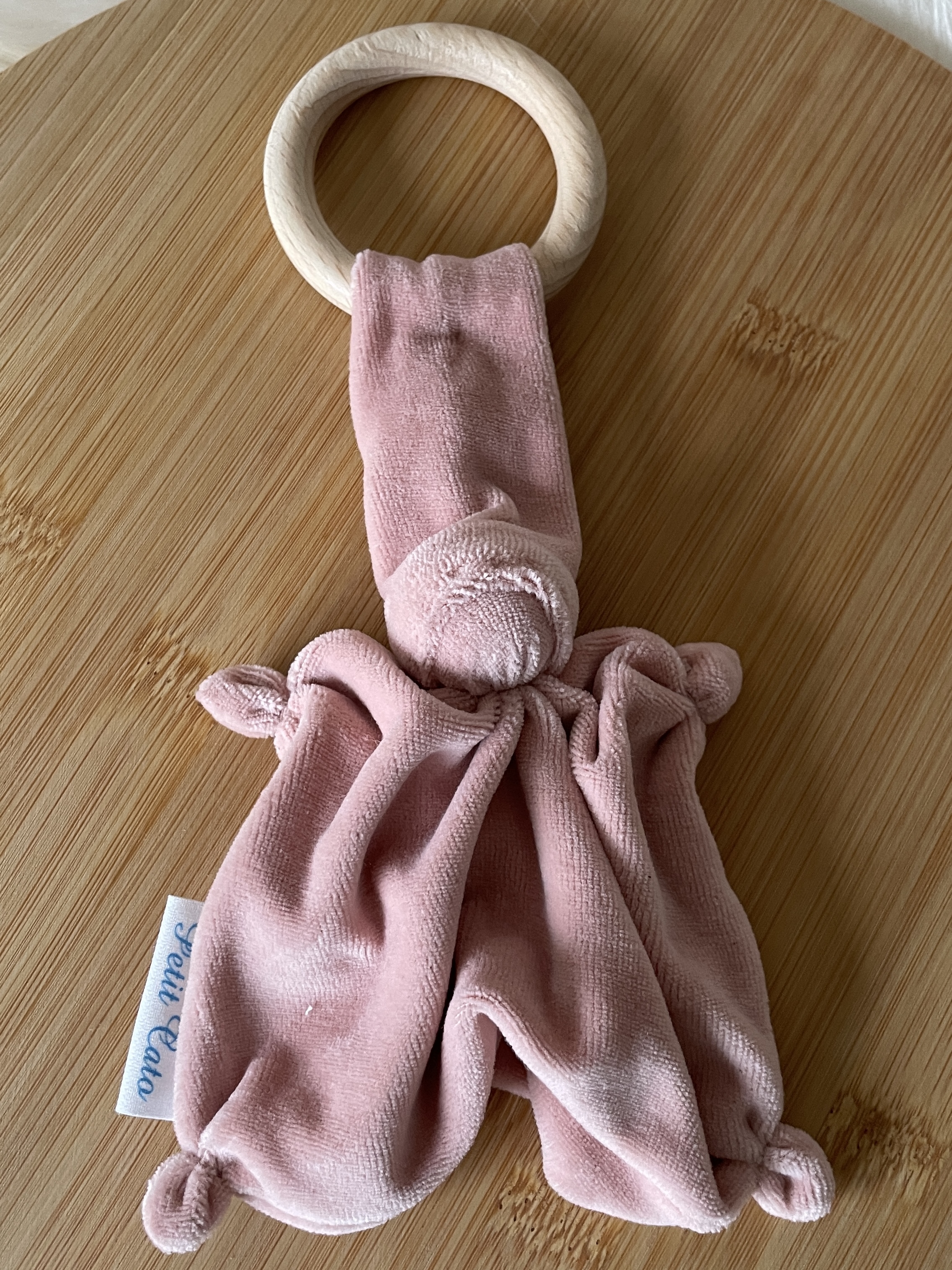 Bijtring roze ring