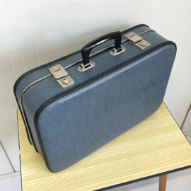 Blauwe vintage koffer