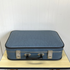 Blauwe vintage koffer