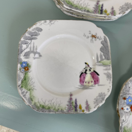 Set antieke gebaksbordjes
