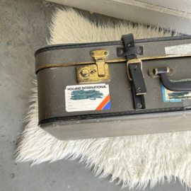 Grijze vintage koffer