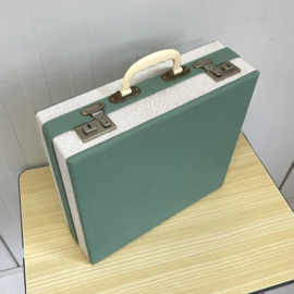 Groene vinyl koffer