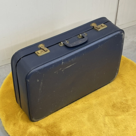 Blauwe vintage koffer