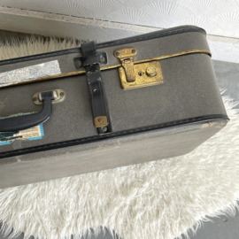 Grijze vintage koffer