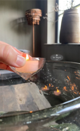Glazen drijf schaaltje voor een waxinelichtje