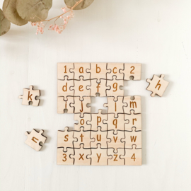 Houten alfabet puzzel