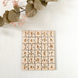 Houten alfabet puzzel