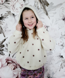 Sweater geborduurde bloem