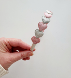 Zilveren diadeem met zilveren + roze hartjes