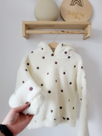Sweater geborduurde bloem
