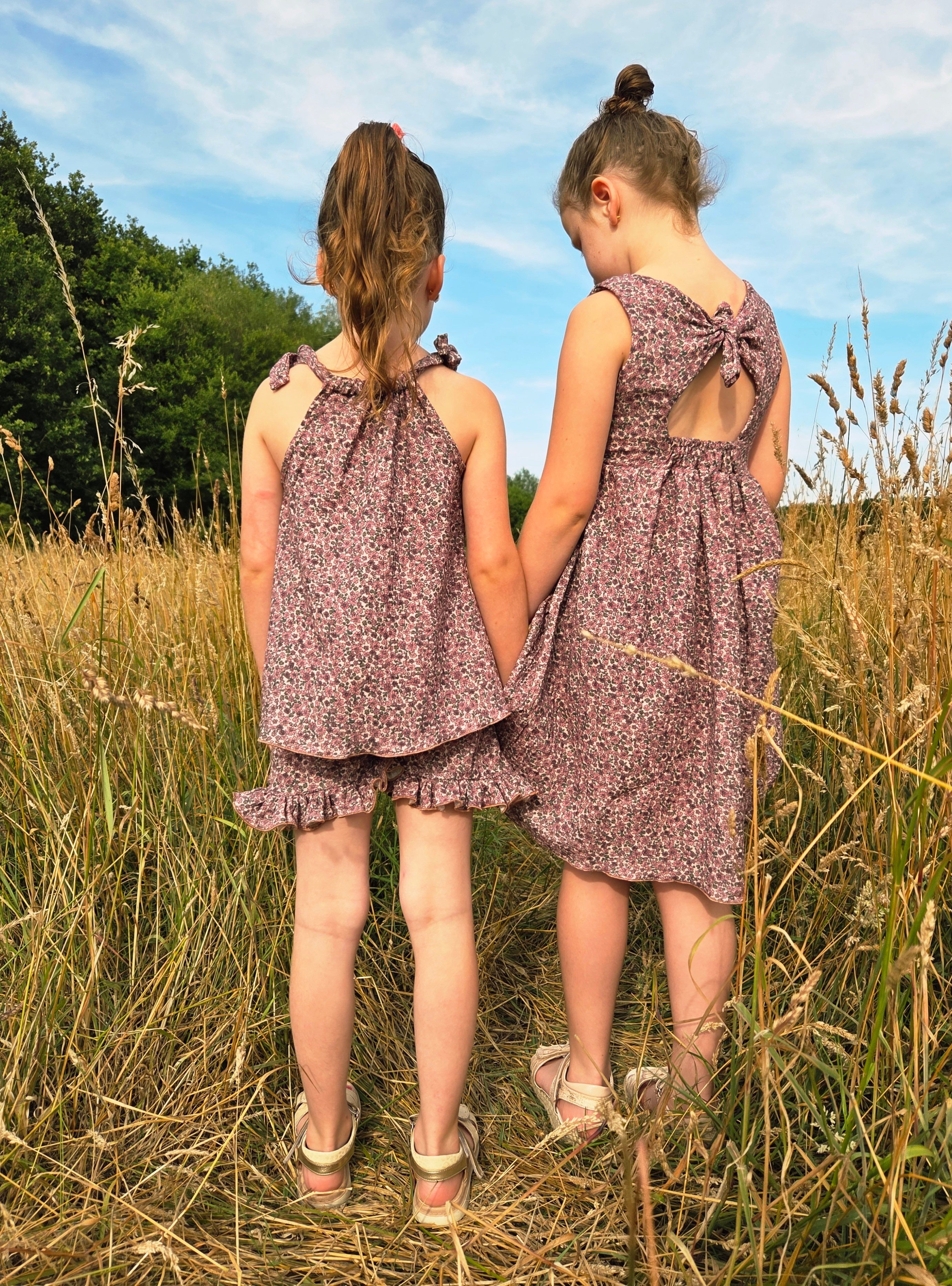 Strikjurk - roze bloemetjes