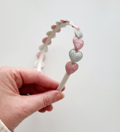 Zilveren diadeem met zilveren + roze hartjes