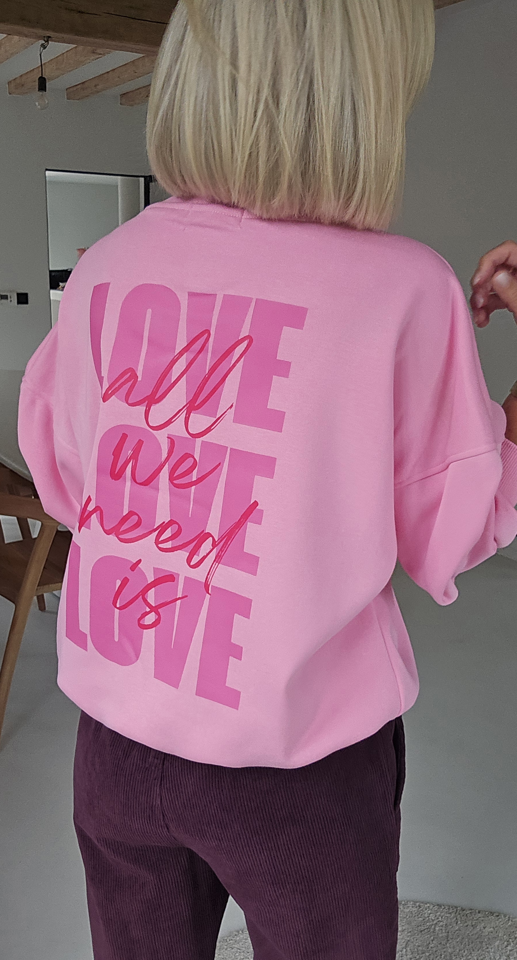 ALL WE NEED IS LOVE sweatshirt pink