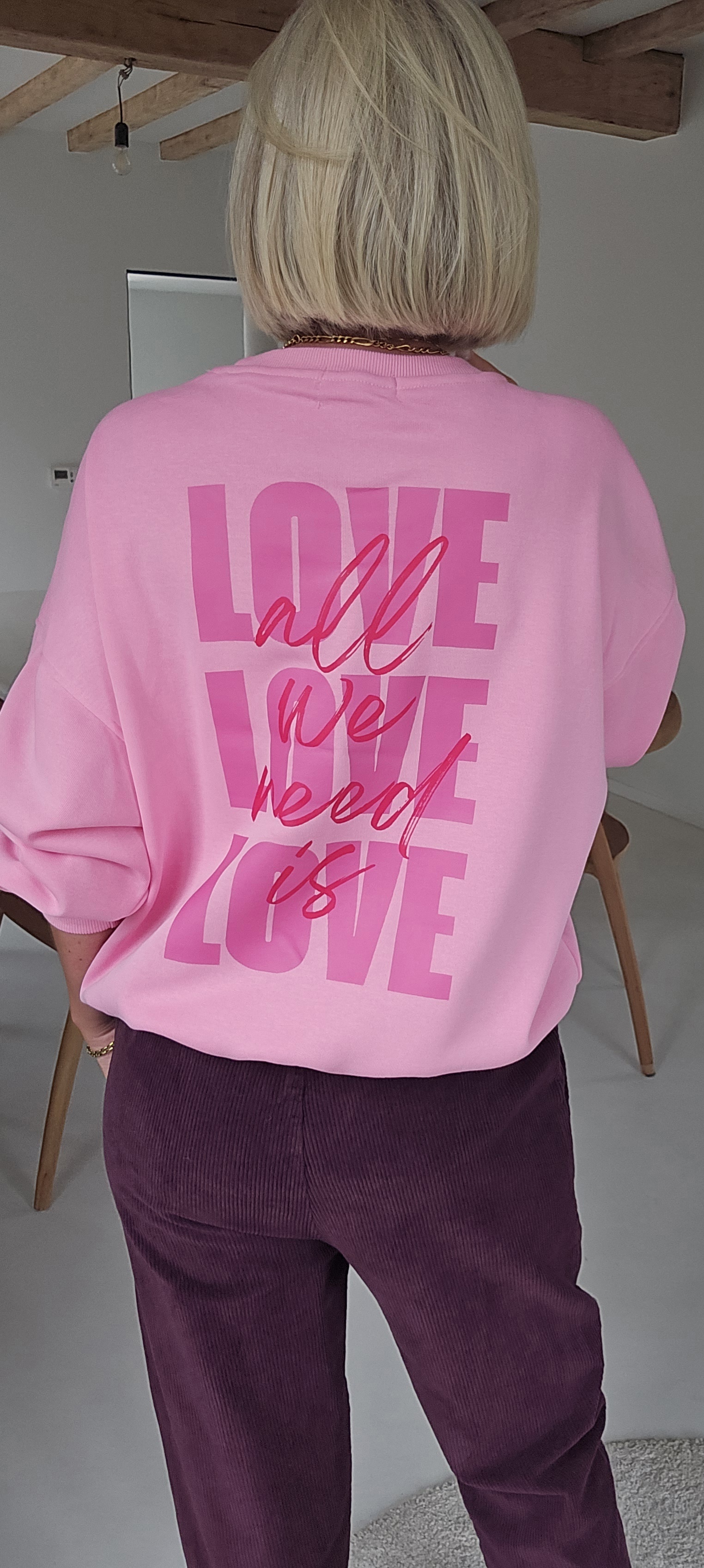 ALL WE NEED IS LOVE sweatshirt pink
