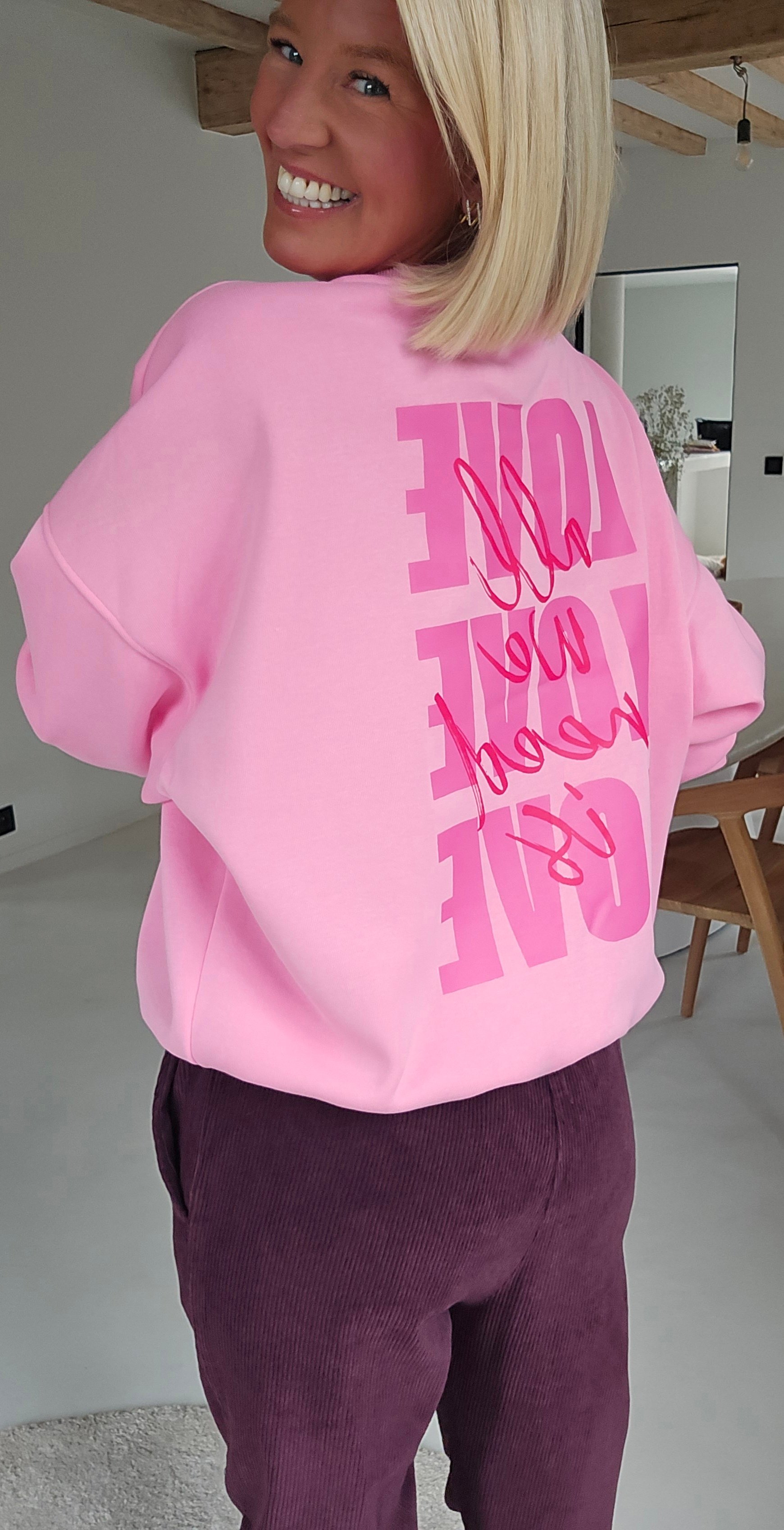 ALL WE NEED IS LOVE sweatshirt pink
