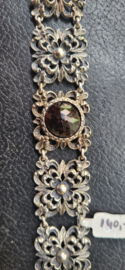Antieke zilver schakelarmband met antieke granaat. 20 cm 2,5 breed 39 gram.