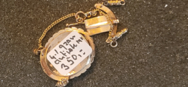 Antiek gouden sluiting steek sieraad  met haar ornament 2.5 bij 2 cm