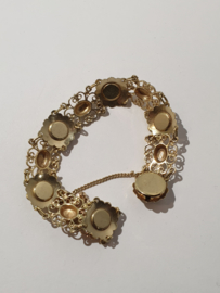 14 kr Gouden schakel armband met granaat 15 gram 17.5 cm