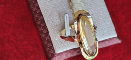 Gouden ring met Citrien kop 2,5 bij 1 cm maat 17 3,8 gram netto.