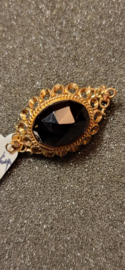 Ouderwetse broche met granaat 14 kr goud  6 gram als nieuw 3,5 bij 2 cm.