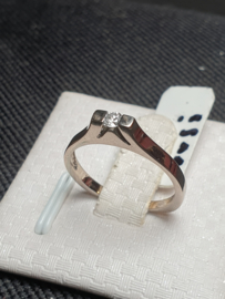 Wit gouden dames ring met briljant 0.05 crt maat 16,5  2.5 mm breed 2.4 gram