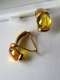 Gouden Citrien oorbellen met pen en klip bruto 8,5 gram.