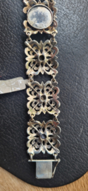 Antieke zilver schakelarmband met antieke granaat. 20 cm 2,5 breed 39 gram.