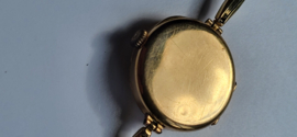 Antiek gouden dameshorloge met verende rekband en kast diameter 2,5 cm