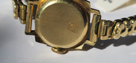 Antiek gouden dameshorloge met verende rekband en kast diameter  18mm