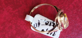 Gouden ring met Citrien kop 2,5 bij 1 cm maat 17 3,8 gram netto.