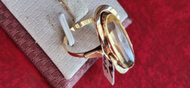 Gouden ring met Citrien kop 2,5 bij 1 cm maat 17 3,8 gram netto.