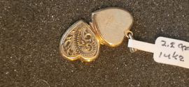 14 kr gouden medaillion model hard nette staat 2 cm 2,3 gram.