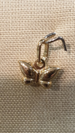Klein goud bedeltje  model vlinder 9 bij 6 mm 0.3 gram