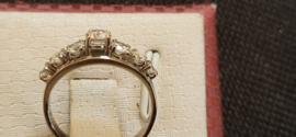 Wit gouden dames ring met 0,80 crt aan 7x briljanten vvsi wit nieuwstaat.