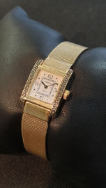 14 Kr gouden dames horloge met gouden band merk Geneve 17 cm 28 gram