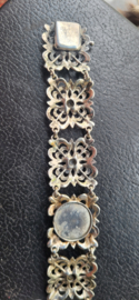 Antieke zilver schakelarmband met antieke granaat. 20 cm 2,5 breed 39 gram.