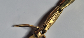Antiek gouden dameshorloge met verende rekband en kast diameter 2,5 cm