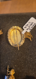 Streek sjaalbroche model S met kwast 1920 goud