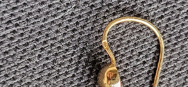 Apparte antiek klederdracht oorbellen kompleet zondergebreken 14 kr goud.