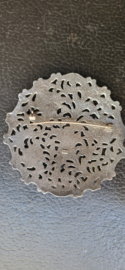 Zilver broche opengewerkt  6,5 cm 1e gehalte