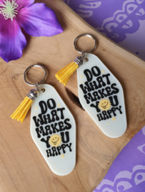 Sleutelhanger met tekst 'Do what makes you happy' glow in the dark