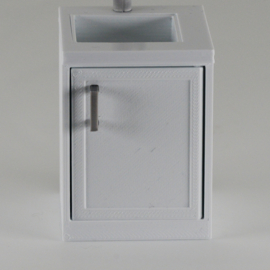 Cabinet with sink and tap and hinge on the right
