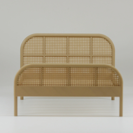 Double rattan bed with hole pattern